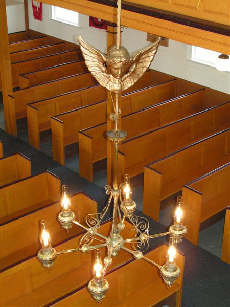 This Cherub Chandelier is located in St. Peter's Anglican church, Twillingate, Newfoundland, Canada. This Chandelier was donated to the church by John Slade in 1845. 